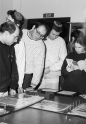 [Cambridge chaplain Rabbi Shaul Robinson viewing a Genizah exhibition]